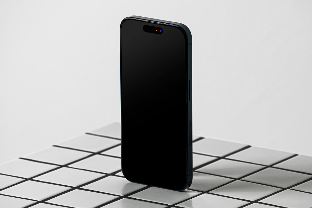 Free Standing iPhone 15 Pro Mockup PSD