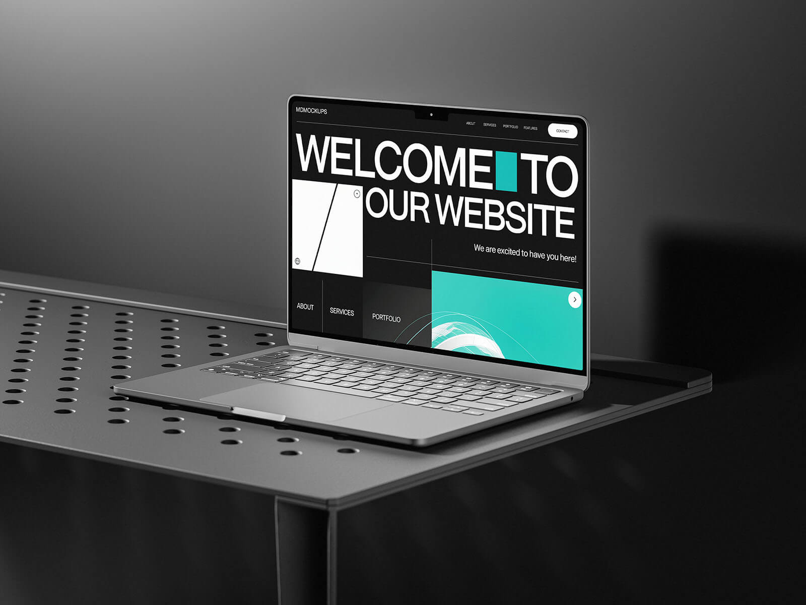 Free MacBook On A Black Table Mockup PSD Set