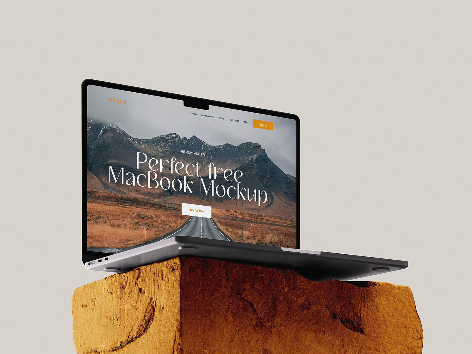 3 Free MacBook Mockups On Stone PSD