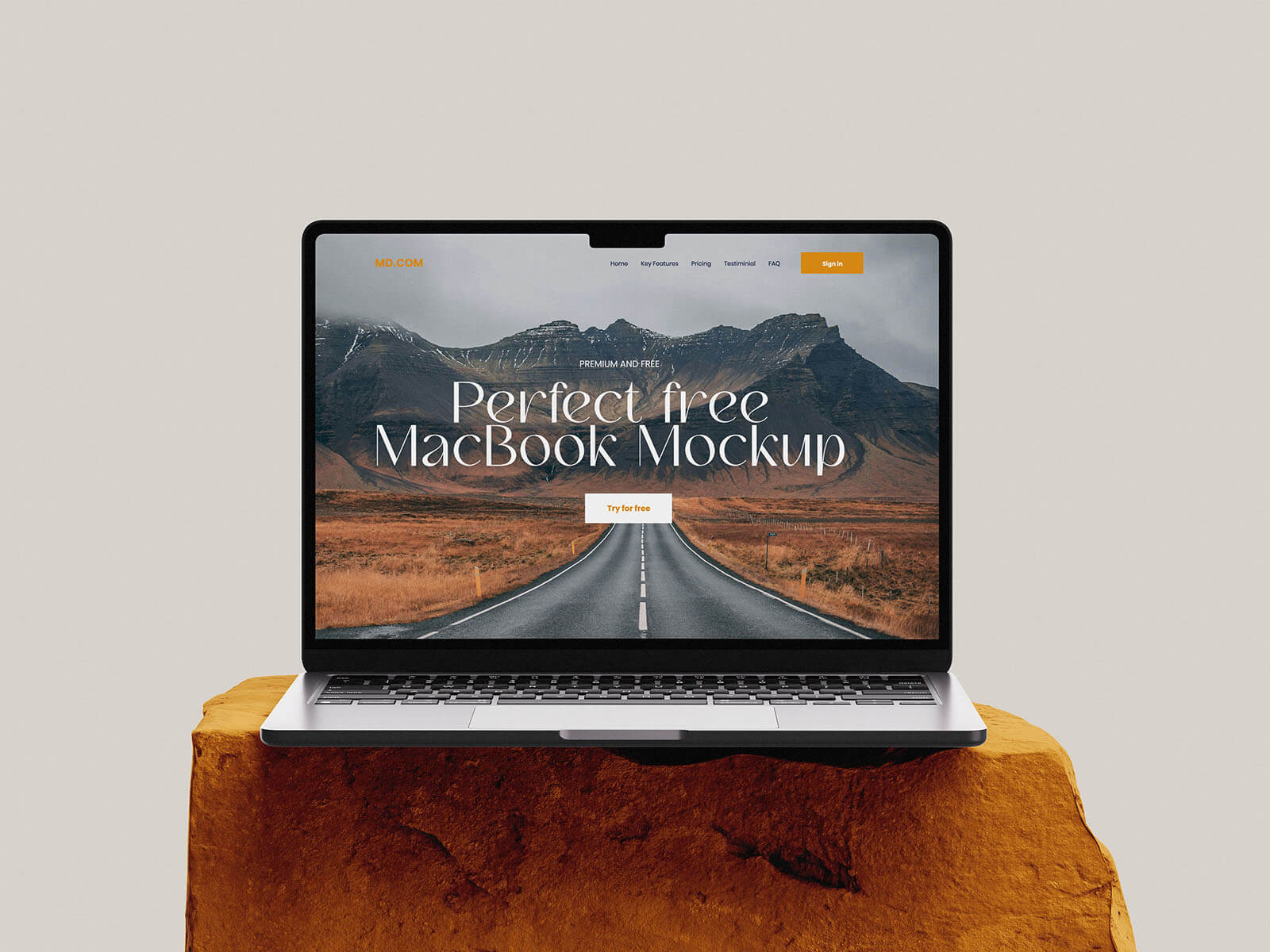 3 Free MacBook Mockups On Stone PSD