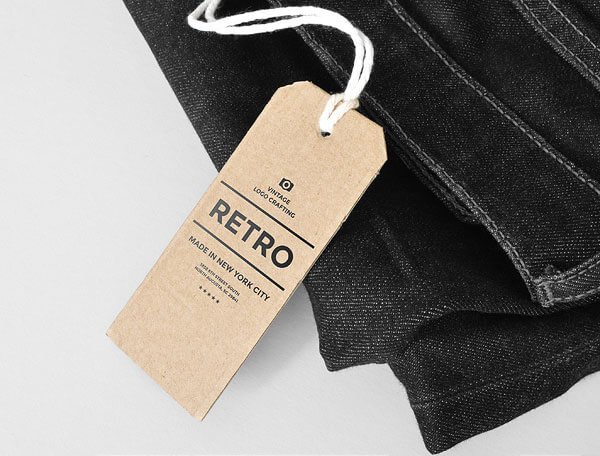 Free Cardboard Hang Tag On Jeans Mockup PSD