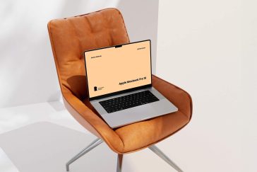 Free Office Chair 16″ M4 MacBook Pro Mockup PSD