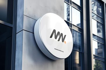 Free Round Signboard Mockup On Building Wall PSD