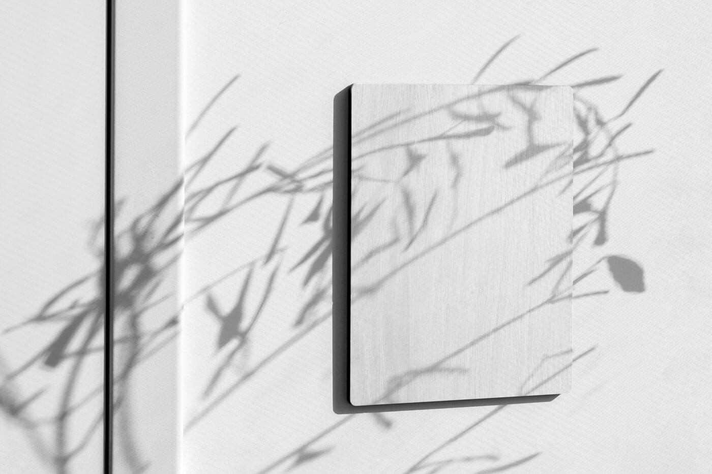 Free Wall-Mounted Wooden Sign Mockup PSD