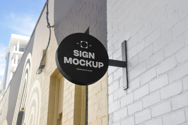 Free Wall-Mounted Round Shop Sign Mockup PSD
