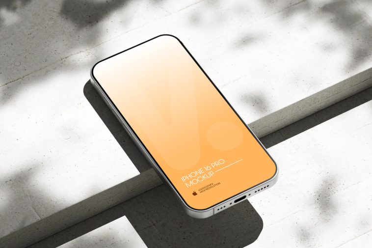 Free Silver iPhone 16 Pro On Concrete Mockup PSD