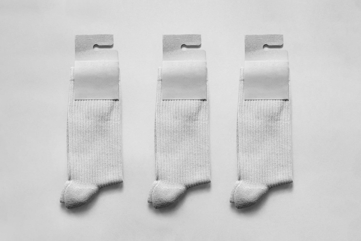 Free Socks With Hanging Label Mockup PSD