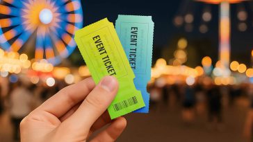 Free Hand-Holding Event Tickets Mockup PSD