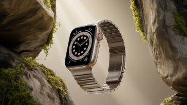 Apple Watch Ultra 2 suspended between moss-covered granite rocks with soft sunlight and a beige gradient background.