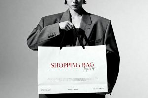 B&W Model Holding Shopping Bag Mockup