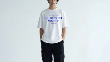 urban streetwear studio t shirt mockup with model minimal background high quality apparel mockup PSD