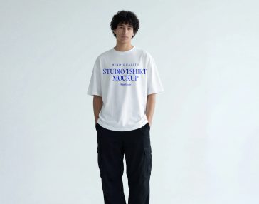 urban streetwear studio t shirt mockup with model minimal background high quality apparel mockup PSD