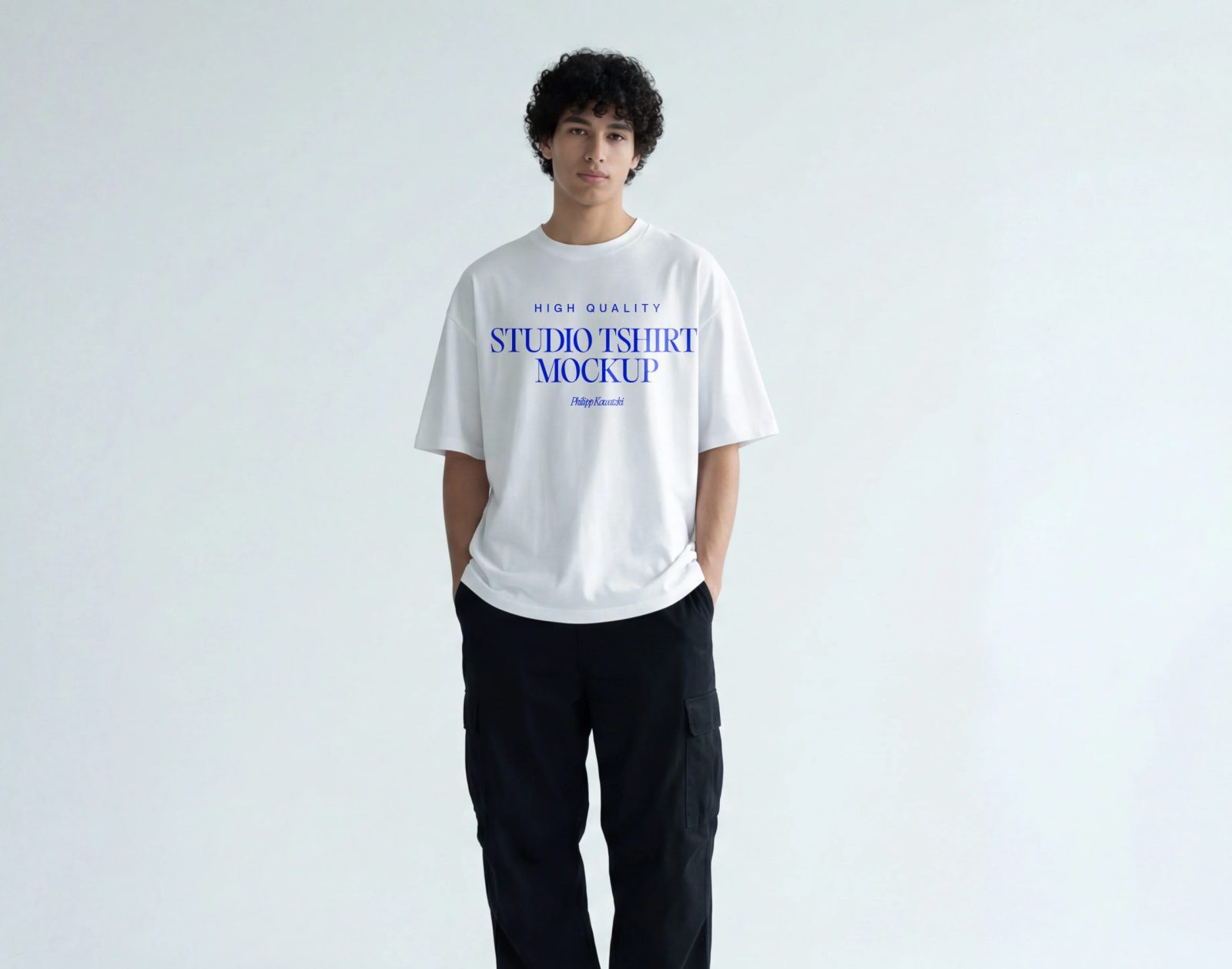 urban streetwear studio t shirt mockup with model minimal background high quality apparel mockup PSD