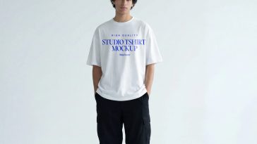 urban streetwear studio t shirt mockup with model minimal background high quality apparel mockup PSD