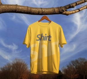 t shirt mockup hanging on tree outdoor realistic apparel design psd template