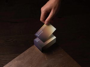 premium stacked business card mockup psd realistic luxury branding card on oak wood surface display hand holding business card mockup dark background corporate identity presentation