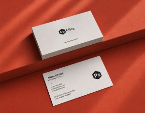 Premium business card mockup PSD with stacked cards on orange background