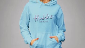 Female hoodie mockup PSD showing woman wearing light blue pullover hoodie — PsFiles.com free download